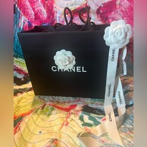 Chanel Black Bag with White Floral Detail